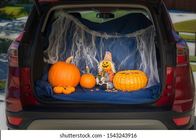 A Car Is Decorated For Trunk Or Treat Event, An Alternative For Kids Trick Or Treating In A Safe Environment On Halloween Night. 