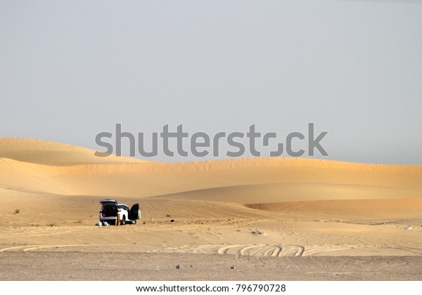 A car in the\
desert