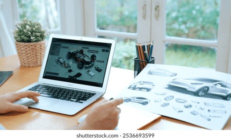 Car design engineer analyze car prototype for automobile business at home office. Automotive engineering designer carefully analyze, finding flaws and improvement for car design with laptop Synchronos