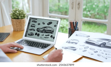 Car design engineer analyze car prototype for automobile business at home office. Automotive engineering designer carefully analyze, finding flaws and improvement for car design with laptop Synchronos