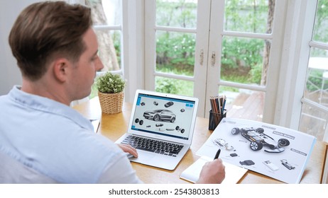 Car design engineer analyze car prototype for automobile business at home office. Automotive engineering designer carefully analyze, finding flaws and improvement for car design with laptop Synchronos
