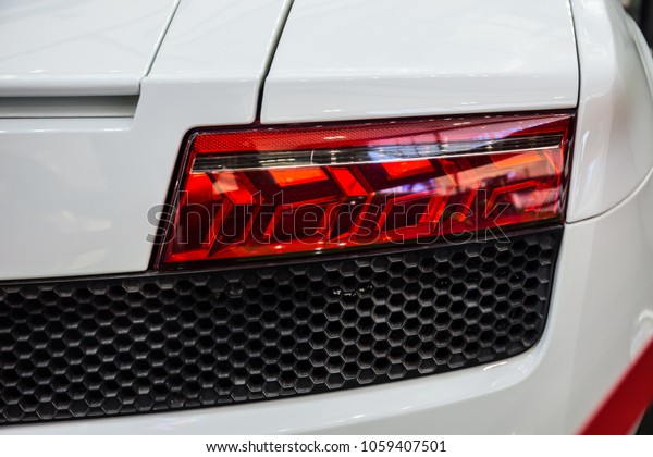 Car detail is new led taillight The rear lights of\
the car, in hybrid sports car. Developed Modern Car\'s rear brake\
light. Select focus