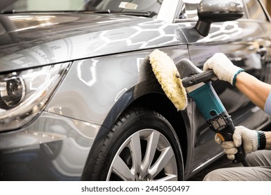 Car Detailing - Expertly polishes a luxury vehicle, creating a glossy shine. Ideal for automotive maintenance - Powered by Shutterstock