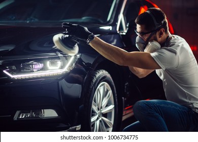Car detailing - Hands with orbital polisher in auto repair shop. Selective focus. - Shutterstock ID 1006734775