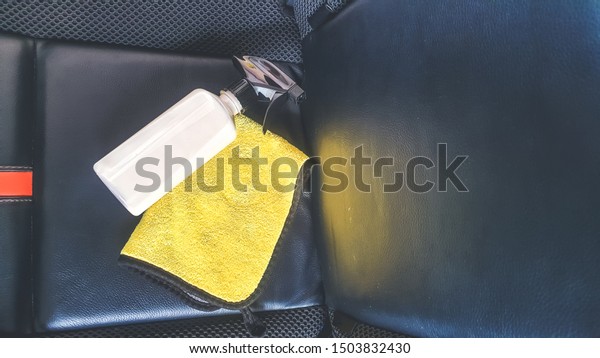 Car\
Detailing Process. Interior Cleaning.  Spray and Coat car interior\
with leather wax and wipe out by microfiber\
cloth.