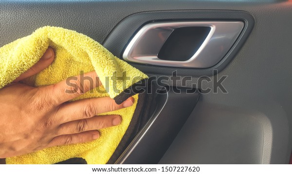 Car\
Detailing Process. Interior Cleaning.  Spray and Coat car interior\
with leather wax and wipe out by microfiber\
cloth.