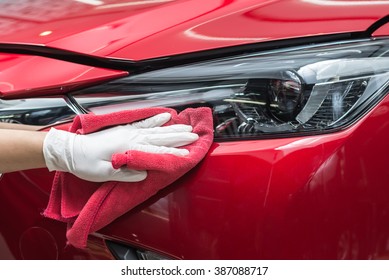 Car Detailing Series : Worker Cleaning Red Car