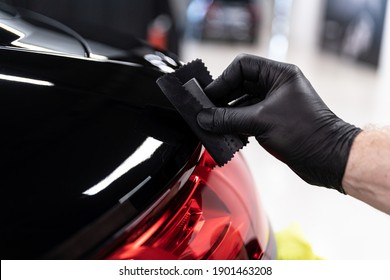 Car Detailing Studio Worker Applying Ceramic Coating