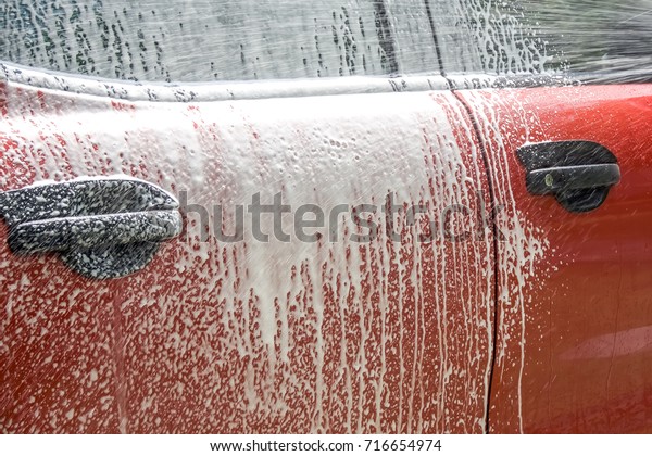 Car detailing\
: Car Washing with Foam\
Shampoo.
