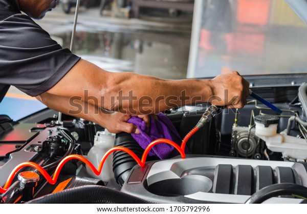 Car details - car engine mechanic, clean after\
washing the car engine