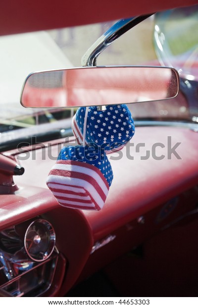 Car dice with american\
flag