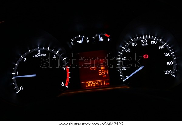 Car digital speedmeter dashboard modern automatic\
panel at night