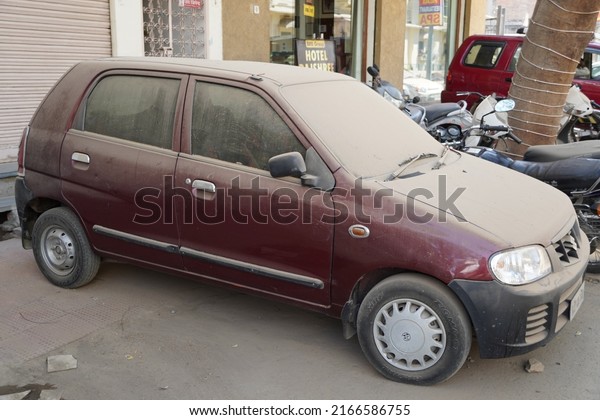 Car with dirt And dirt on\
the surface of the car paint and car glass, the concept of car\
care. Extremely dirty. Dirty side. Element of design. Udaipur India\
May 2022