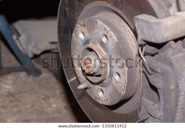 Car disk brakes repair service performed. Brake disk
and a wheel hub