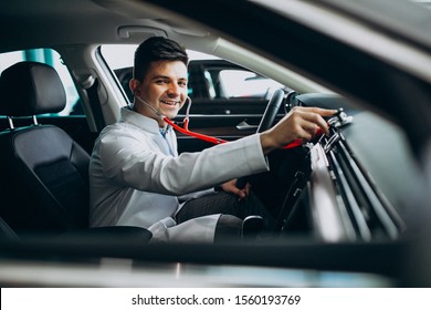 Car Doctor With Stethoscope In A Car Showroom