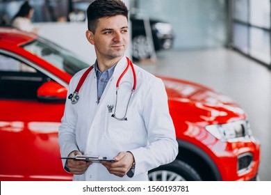 Car Doctor With Stethoscope In A Car Showroom