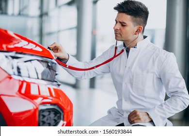 Car Doctor With Stethoscope In A Car Showroom