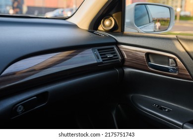 Car door control right panel. New car interior. Window lifters control. Armrest with setting adjustment button and blocking the opening and closing of doors. Car inside door chrome handle. Door trim. - Shutterstock ID 2175751743