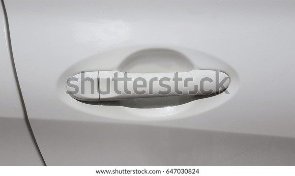 car door  handle\
white