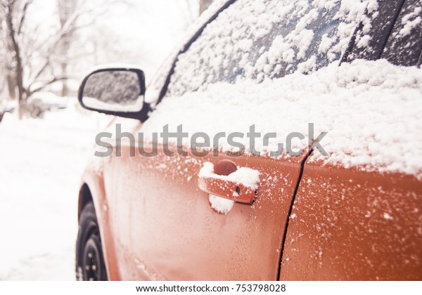 Car\
door handle winter frost snow flakes ice\
crystals