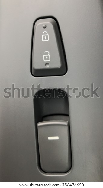 Car door lock\
button