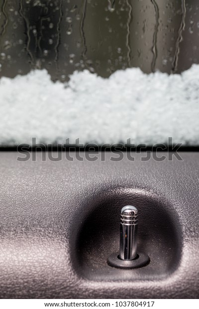 Car door lock shot on a\
snowy day