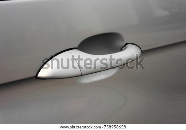 Car door opening handle.\
silver car