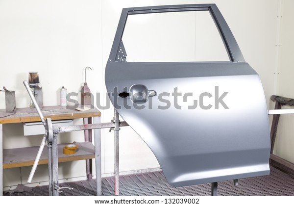 Car door\
prepared to be painted by car body\
painter