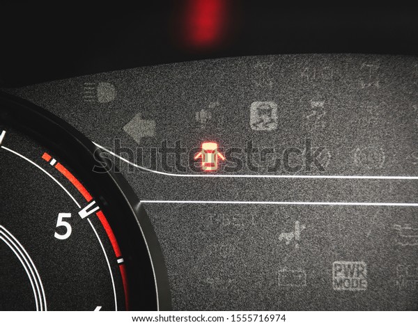 Car door warning\
light on a car dashboard.