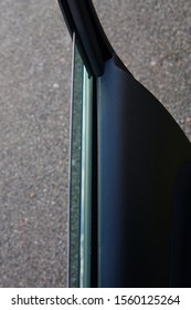 A Car Door Weather Strip And Corner Seal, With A Part Shown Glass Window And Channel Guide And Interior Door Moulding.