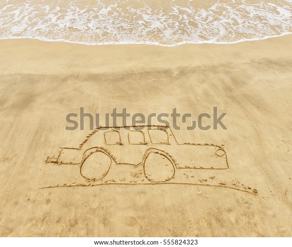 car drawing in the\
sand