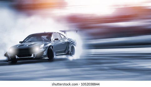 Car drifting, Blurred of image diffusion race drift car with lots of smoke from burning tires on speed track - Shutterstock ID 1052038844