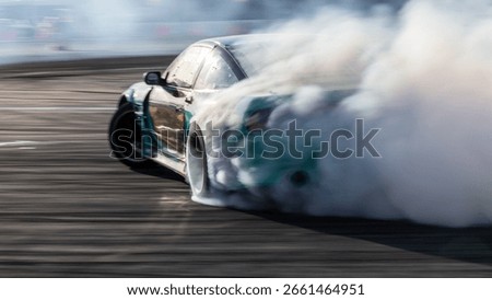 Car drifting, Blurred image diffusion race drift car with lots of smoke from burning tires on speed track, Car drifting on speed track, Professional driver drive drifting car.