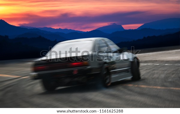 Car drifting, Blurred of image diffusion race drift\
car on speed track