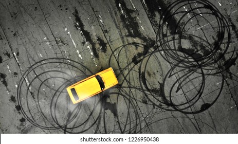 Car drifting. Professional driver drifts a yellow car on a parking lot. Aerial view from above. 