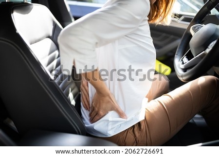 Car Driver Back Pain Injury. Bad Posture