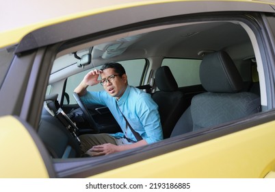 A Car Driver Showing Confused Expression