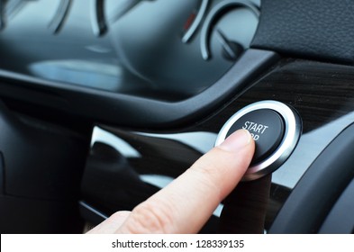 Car driver starting the engine
