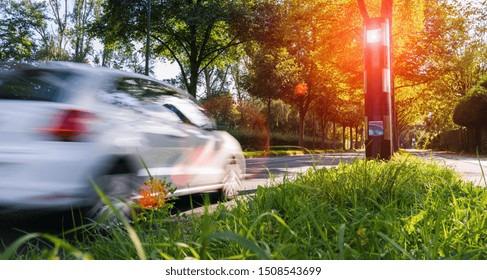 Car Drives Into A Radar Trap, Safe Road Traffic Concept Image