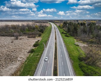 Car Driving Down The Parkway In Upstate New York