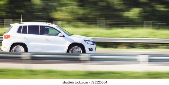 Car Driving Fast Motion On Highway Side View