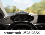 Car driving on empty road at high speed, view from driver