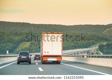 Car driving on the highway from Rijeka to Zagreb with Gorski Kotar forest in the background in Croatia.