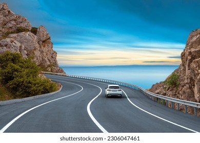 car driving on the road of europe. road landscape in summer. it's nice to drive on the beach side highway. Highway view on the coast on the way to summer vacation. Turkey trip on beautiful travel road