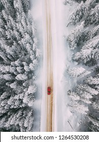 Car Driving On Winter Road. Seen From Above. Aerial Photography. Location: Rarau Mountains, Romania.