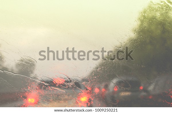 Car
driving in a rain storm background.traffic
jam