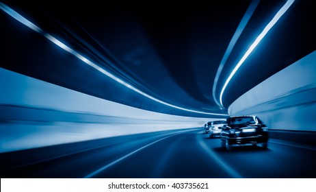 Car Driving Through Tunnel