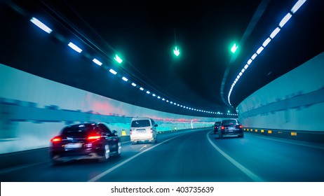 Car Driving Through Tunnel