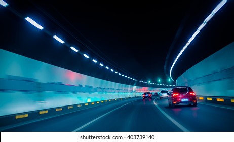 Car Driving Through Tunnel