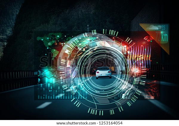 car driving through\
tunnel; highway tunnel at night.car HUD dashboard. Futuristic user\
interface HUD and Infographic elements. Abstract virtual graphic\
touch user interface.